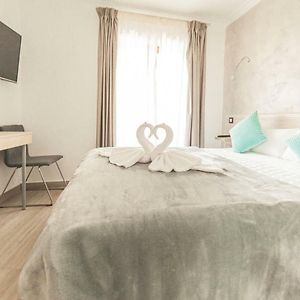 Kamer met een Queen Size Bed